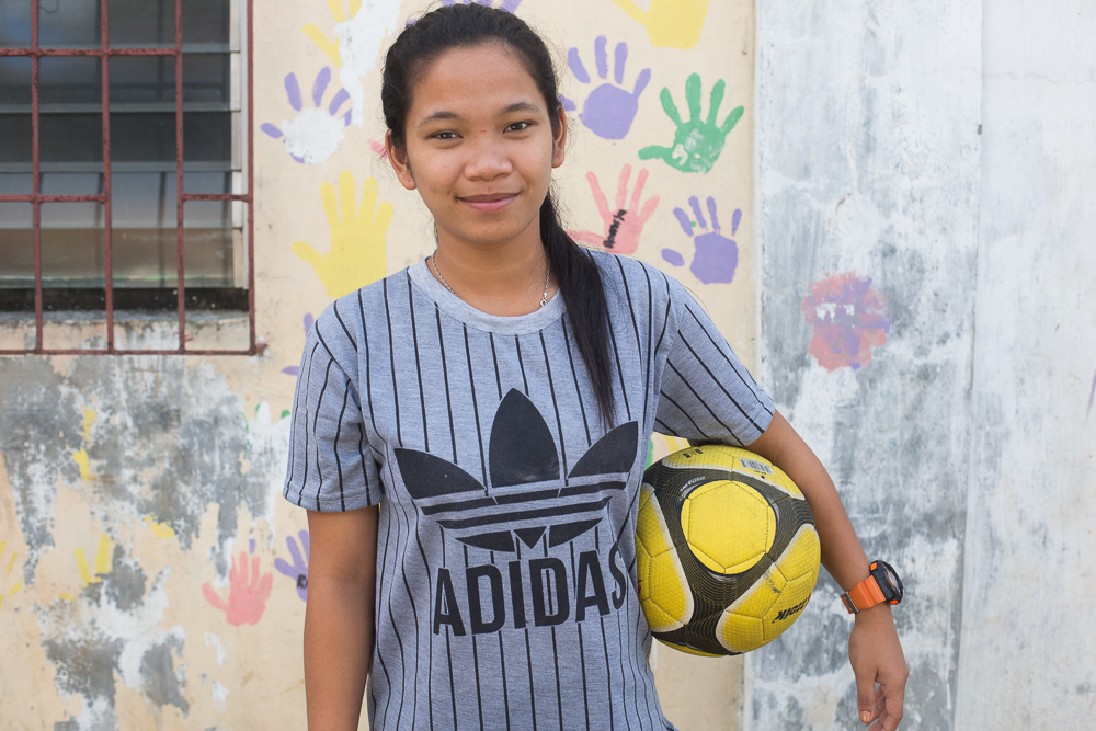Street child with football